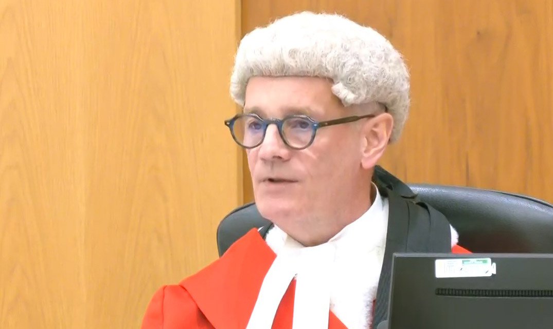 Screen grab taken from PA Video of Mr Justice Bright at Manchester Crown Court during the sentencing of Paul Quinn for the 2003 rape attack, for which innocent man Andrew Malkinson was jailed for 17 years. Picture date: Friday June 5, 2026. PA Photo. Photo credit should read: PA Video/PA Wire