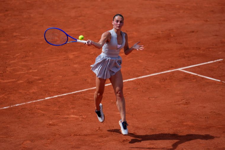 PARIS, FRANCE - MAY 29: Marta Kostyuk of Ukraine plays a forehand against Viktorija Golubic of Switzerland in the Women's Singles Third Round match on Day Six of the 2026 French Open at Roland Garros on May 29, 2026 in Paris, France. (Photo by Franco Arland/Getty Images)