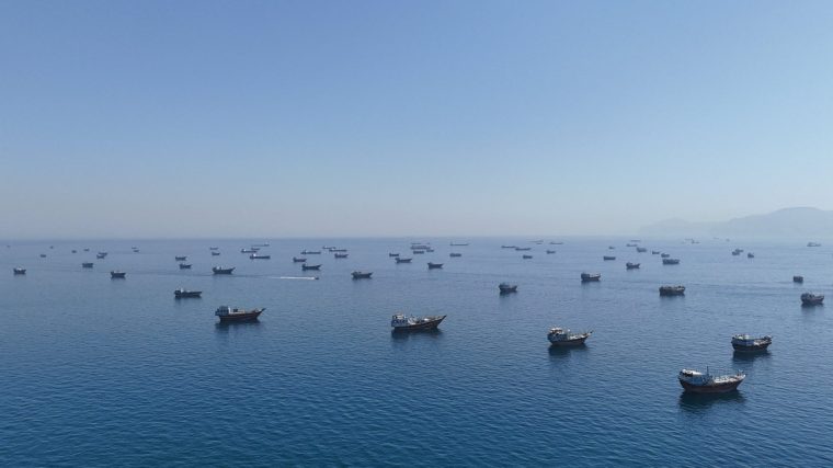 A drone view of vessels anchored in the Strait of Hormuz as seen from Musandam, Oman, June 8, 2026. REUTERS/Stringer