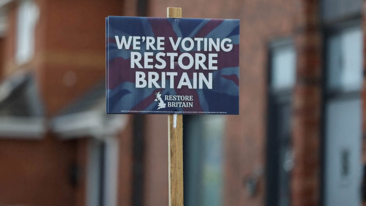 A campaign placard for the Restore Britain political party is displayed outside a residential property, ahead of the Makerfield by-election, in Ashton-in-Makerfield, Britain, June 9, 2026. REUTERS/Temilade Adelaja