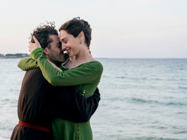 In the Hand of Dante. (L-R) Oscar Isaac as Dante and Gal Gadot as Gemma in In the Hand of Dante. Cr. Alex Majoli/ITHOD Productions Ltd. ?? 2026.