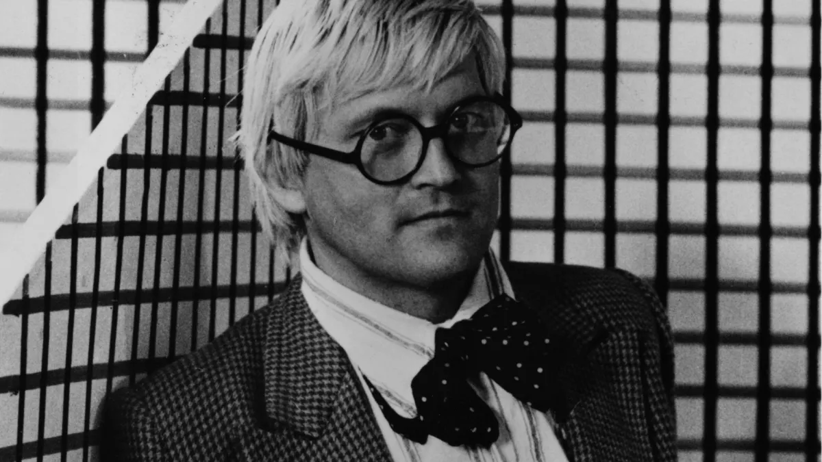 FILE PHOTO: Artist David Hockney dies aged 88 British artist David Hockney in the set of 'The Rake's Progress', which he designed for the Glyndebourne opera festival. (Photo by Graham Wood/Getty Images)