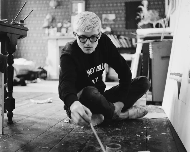 FILE PHOTO: Artist David Hockney dies aged 88 English artist David Hockney working in a studio, circa 1967. (Photo by Tony Evans/Getty Images)