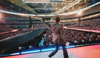 Harry Styles stops Wembley gig mid-song to help 'distressed' fan