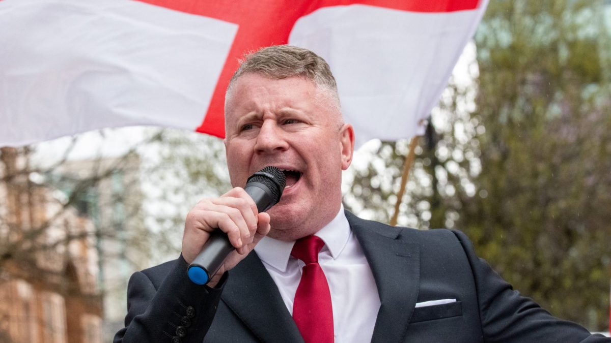 MANCHESTER, UNITED KINGDOM - 2026/04/18: Paul Golding, the leader of Britain First, made a speech in St. Peter's Square, Manchester, following a city centre march by the far-right group. Anti fascist supporters were kept apart from the Britain First march and demonstration by police, including mounted police. Paul Golding, the leader of Britain First, made a speech in St. Peter's Square, Manchester, following a city centre march by the far-right group. Anti-fascist groups formed counter-protests along the route. Police struggled to keep the opposing groups apart. Paul Golding, the leader of Britain First, made a speech following a speech by co-leader Ashlea Simon. Golding demanded the repatriation of immigrants and the execution, as traitors, of political figures, including the Prime Minister Keir Starmer. Britain First supporters carried England flags and shouted abuse at the counter protesters, who included members from Stand Up to Racism. Manchester Council had paid for displays for Manchester to stand against hate throughout the city. (Photo by Gary Roberts/SOPA Images/LightRocket via Getty Images)