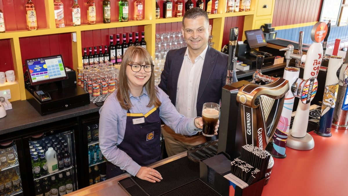 EMBARGOED TO 1500 THURSDAY JUNE 18 Undated handout photo issued by Lidl of bar manager Samantha Hill and regional manager Gordon Cruikshanks, Regional Managing Director for Lidl Northern Ireland outside Lidl Northern Ireland's pub, The Middle Ale, in Dundonald, Belfast. The 60-seater pub is next door to Lidl Dundonald store and will operate independently, with a separate entrance, as a public house with off-sales. Issue date: Thursday June 18, 2026. PA Photo. The pub's wine list has been chosen by Lidl's Master of Wine Richard Bampfield, and the spirits and liqueurs includes Lidl's own-brand Dundalgan whiskey and Wild Burrow Gin, as well as range of pre-mixed cocktails and soft drinks, including their own-brand Freeway cola. Photo credit should read: Lidl/PA Wire NOTE TO EDITORS: This handout photo may only be used for editorial reporting purposes for the contemporaneous illustration of events, things or the people in the image or facts mentioned in the caption. Reuse of the picture may require further permission from the copyright holder.