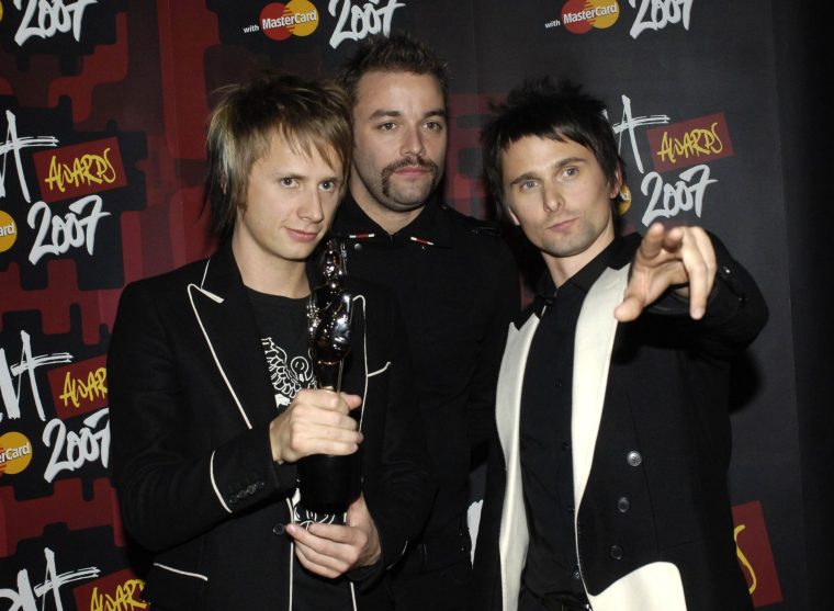 Dominic Howard, Chris Wolstenholme and Matthew Bellamy of Muse, winners Best British Live Act at the Earl's Court in London, United Kingdom. (Photo by Anthony Harvey/WireImage)