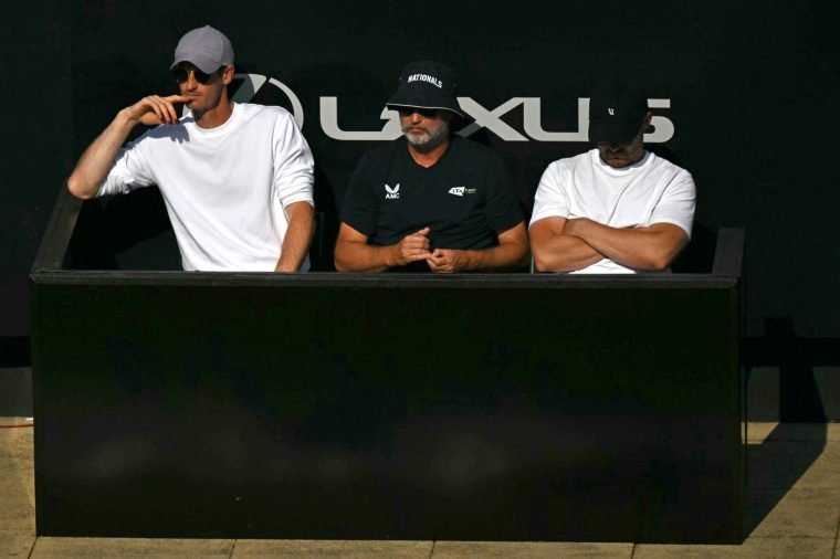 Jack Draper coaching team, with Britain's Andy Murray (L) watch him play against France's Ugo Humbert in their men's semi-final tennis match on day five of the Lexus Eastbourne Open at Devonshire Park, Eastbourne, on the south coast of England on June 26, 2026. (Photo by Glyn KIRK / AFP via Getty Images)