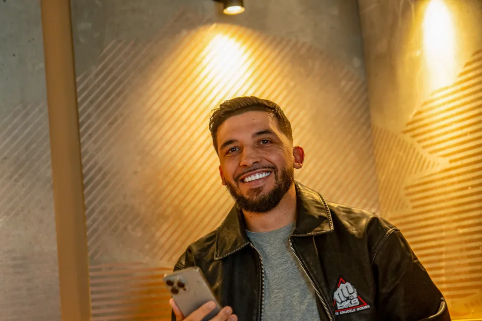 Selby posing after signing with BKB