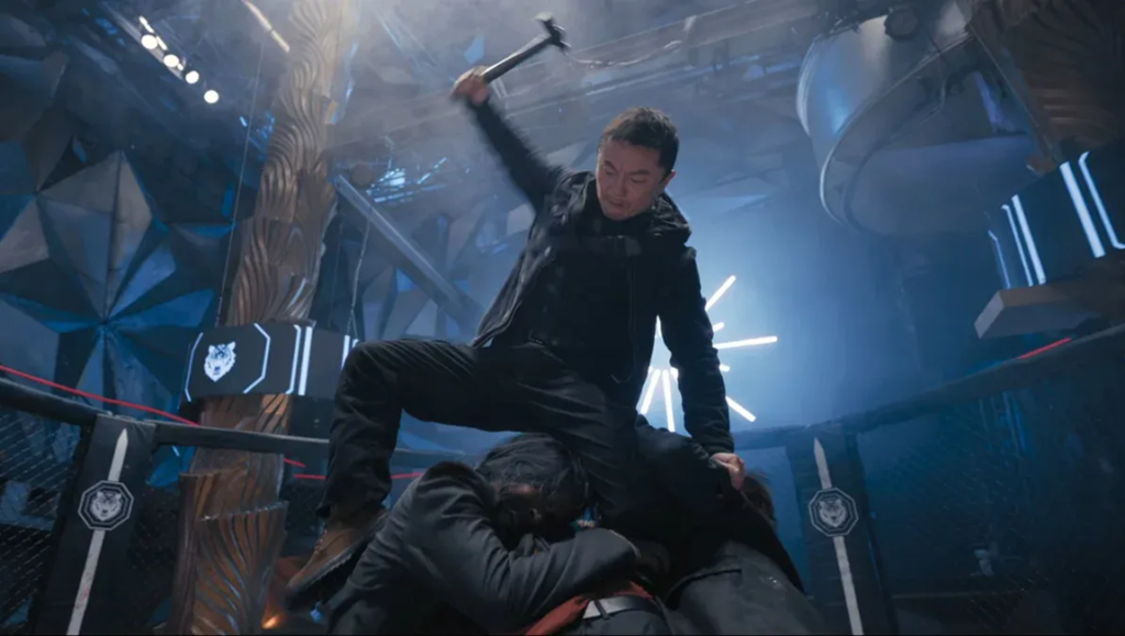 Xie Miao swings a hammer while standing over an opponent in a dark, stylized fighting arena with neon accents.