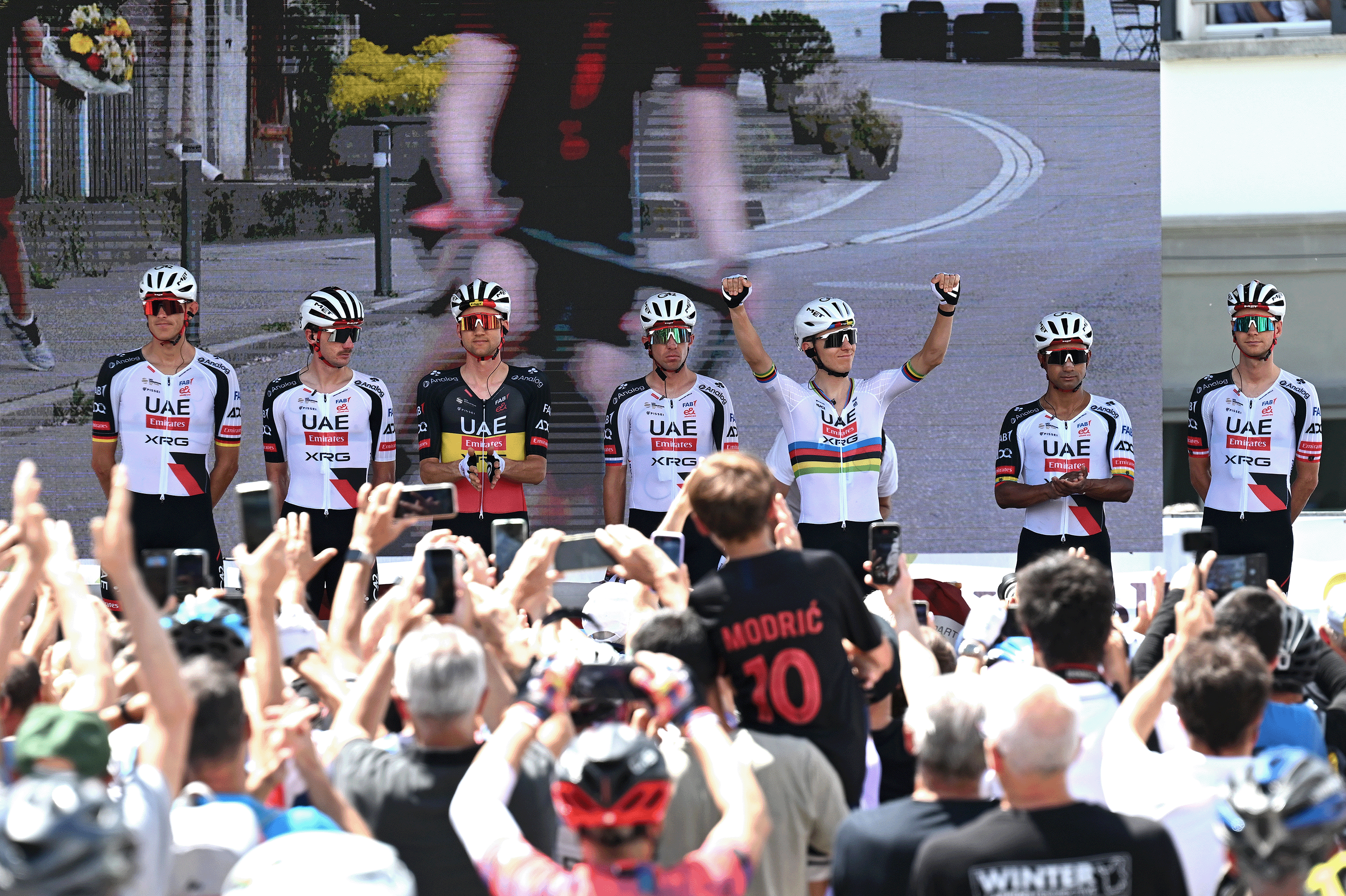 SONDRIO, ITALY - JUNE 17: Tadej Pogacar of Slovenia, Tim Wellens of Belgium, Felix Grossschartner of Austria, Brandon McNulty of United States, Domen Novak of Slovenia, Nils Politt of Germany, Jhonatan Narvaez of Ecuador and UAE Team Emirates - XRG prior to the 89th Tour de Suisse 2026, Stage 1 a 144km stage from Sondrio to Sondrio / #UCIWT / on June 17, 2026 in Sondrio, Italy. (Photo by Tim de Waele/Getty Images)