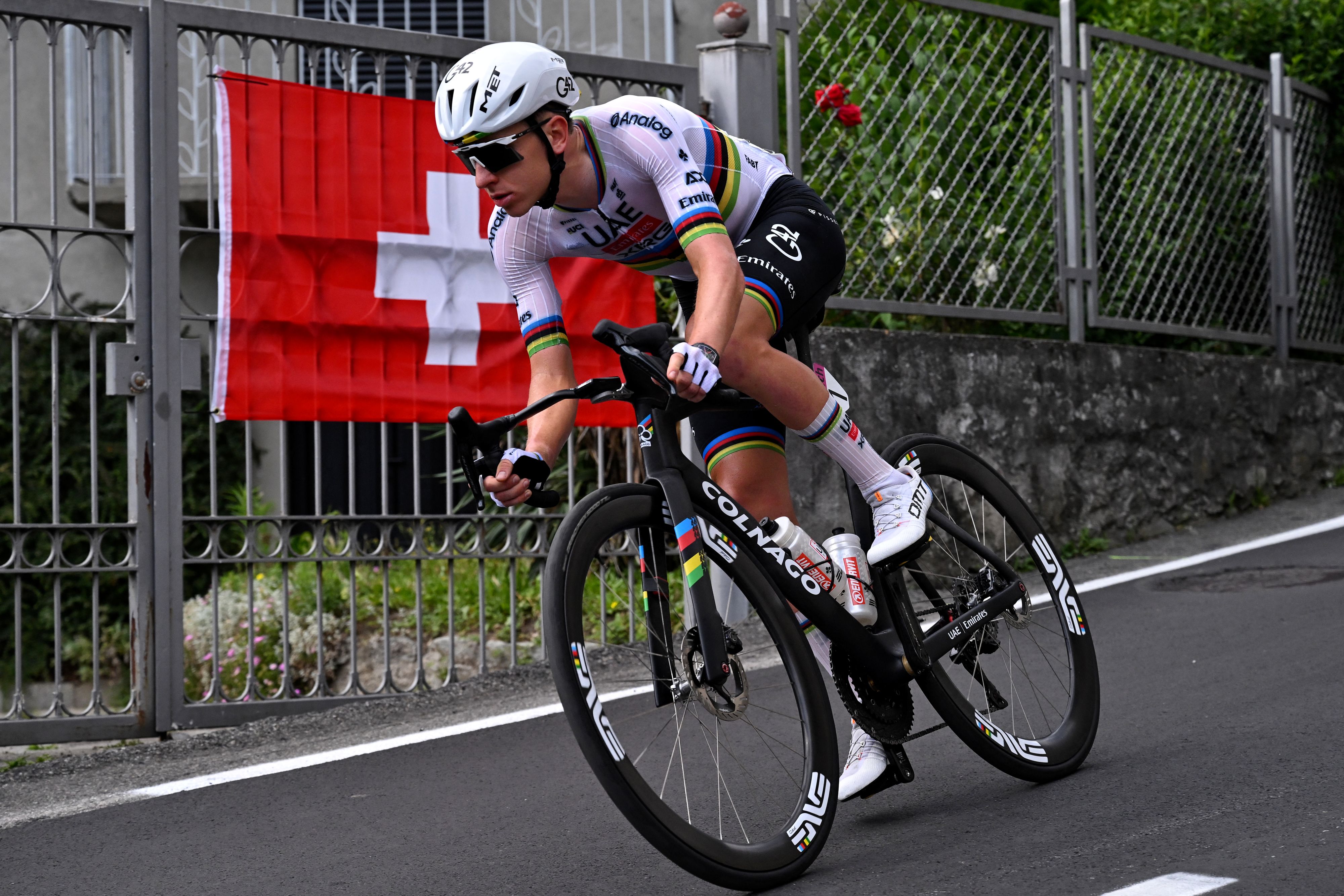 Slovenia's rider Tadej Pogacar of team UAE Emirates - XRG competes in the first stage of the Men's Tour of Switzerland (Tour de Suisse) cycling race, in Sondrio, Italy, on June 17, 2026. (Photo by Marco BERTORELLO / AFP via Getty Images)