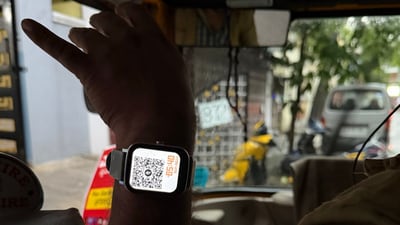 Bengaluru auto driver shows QR code on smartwatch to collect fare. (X/@nothemantsharma)