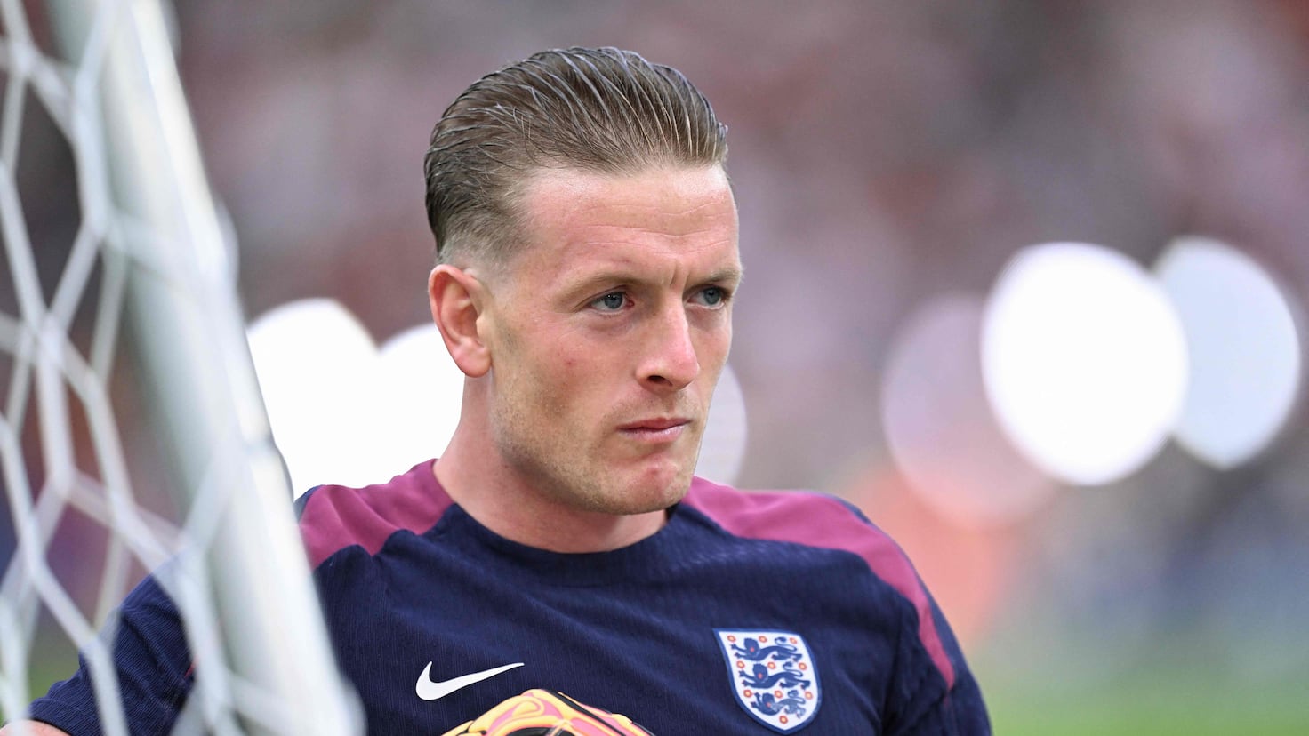 Why does the England soccer team sing the United Kingdom national anthem 'God Save the King'?