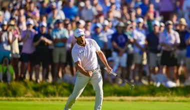 Clark prevails in hostile territory