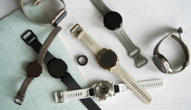 A variety of wearables rest on a collection of 2024 calendars.