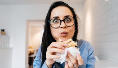 Woman Eating Sandwich