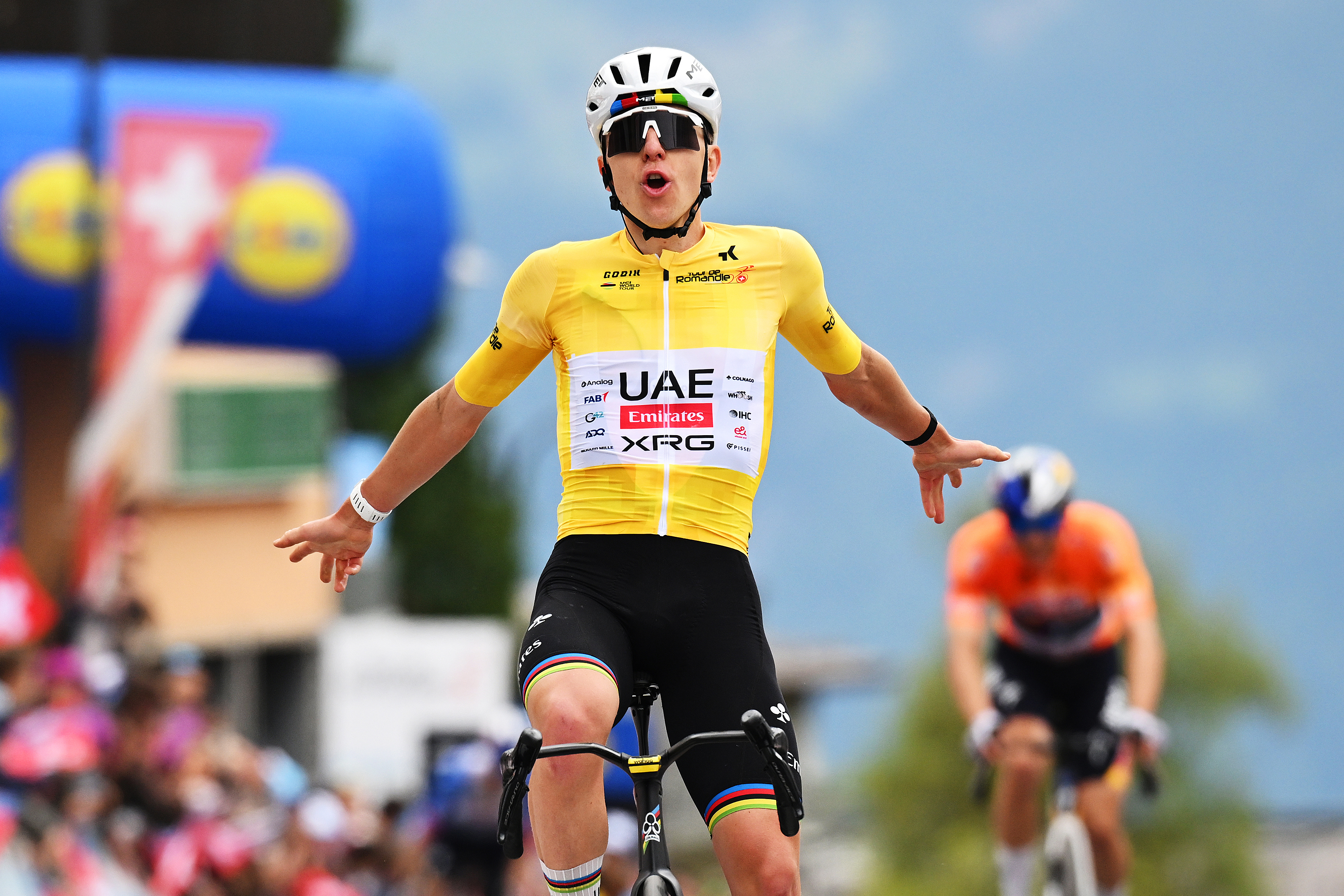 LEYSIN, SWITZERLAND - MAY 03: (EDITOR'S NOTE: Alternate crop) Tadej Pogacar of Slovenia and UAE Team Emirates - XRG - Yellow Leader Jersey celebrates at finish line as stage winner during the 79th Tour de Romandie 2026, Stage 5 a 178.2km from Lucens to Leysin 1312m / #UCIWT / on May 03, 2026 in Leysin, Switzerland. (Photo by Dario Belingheri/Getty Images)