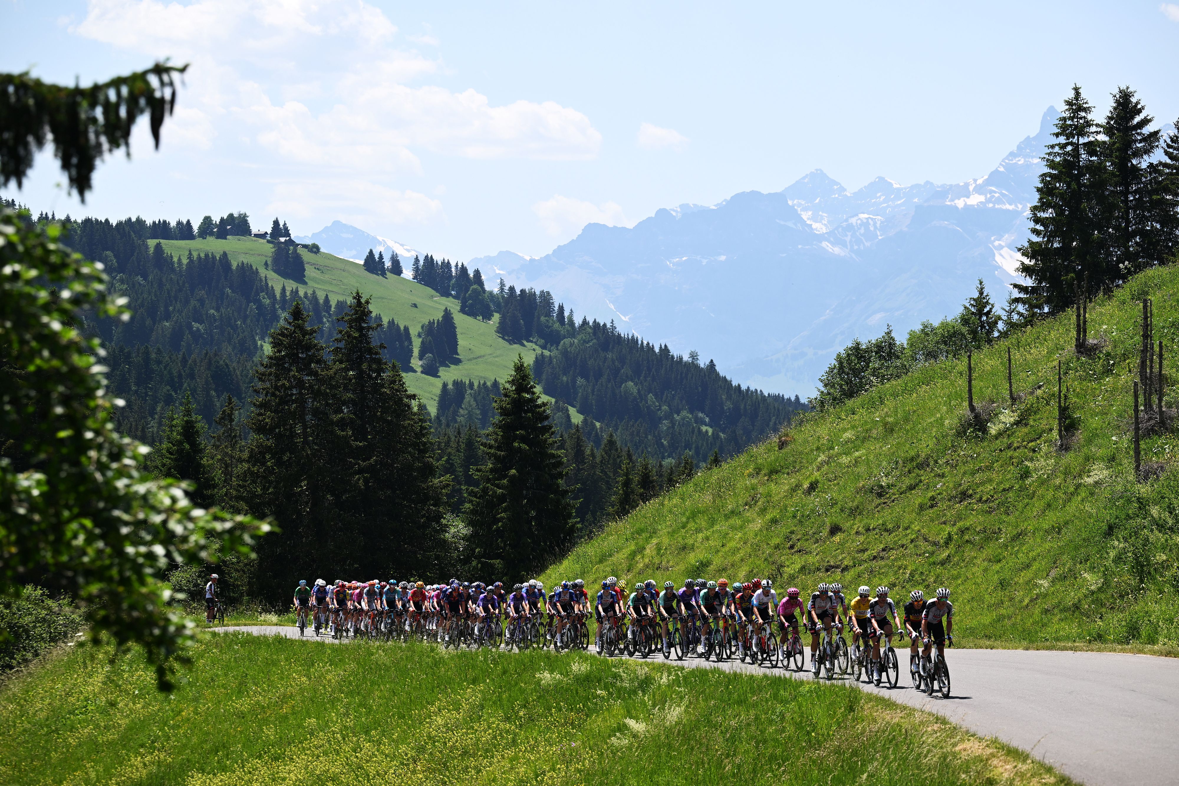 VILLARS-SUR-OLLON, SWITZERLAND - JUNE 21: A general view of the peloton passing through a landscape during the 89th Tour de Suisse 2026, Stage 5 a 150.7km stage from Villars-sur-Ollon to Villars-sur-Ollon 1249m / #UCIWT / on June 21, 2026 in Villars-sur-Ollon, Switzerland. (Photo by Tim de Waele/Getty Images)