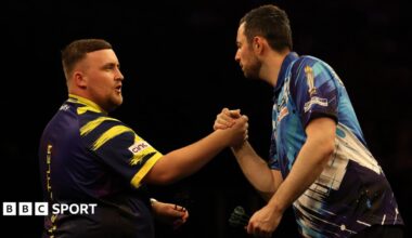 Luke Littler shakes hands with Luke Humphries at the Premier League Darts finals