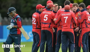 Jersey celebrate taking a Nepal wicket