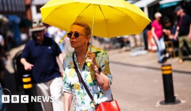 Temperatures could hit 40C in UK as rare red heat warning issued - BBC
