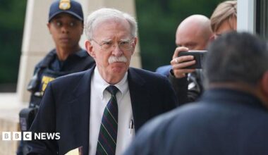 John Bolton arrives in court on Friday