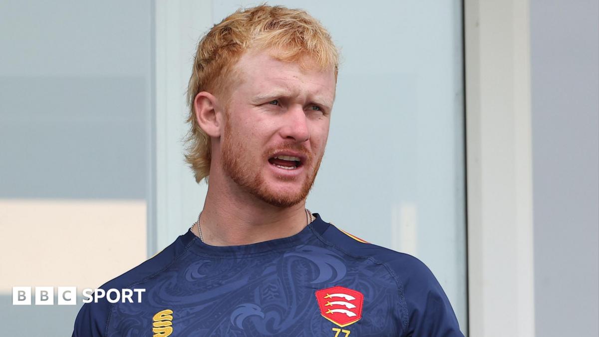 Jordan Cox on the balcony outside the Essex dressing room