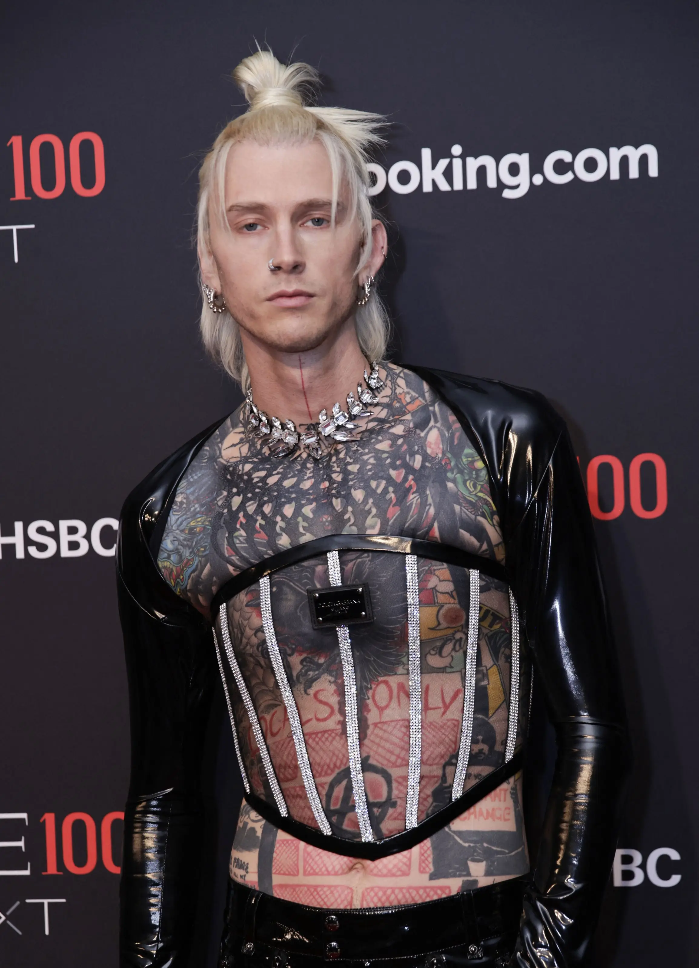 Machine Gun Kelly is known for his unique tattoos (KENA BETANCUR/AFP via Getty Images)