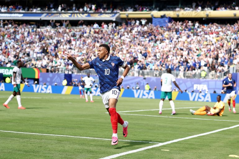 France's forward #10 Kylian Mbappe celebrates after scoring his team's first goal during the 2026 World Cup Group I football match between France and Senegal at the New York/New Jersey Stadium in East Rutherford on June 16, 2026.