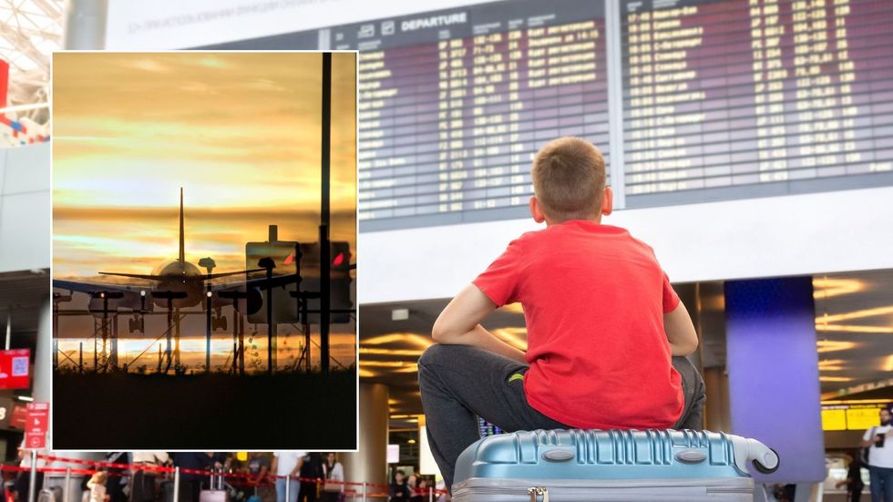 Airplane and boy waiting at terminal