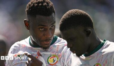 Senegal's Moussa Niakhate talks with team-mate El Hadji Malick Diouf during the group game with France at the 2026 World Cup