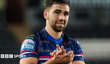 Wakefield Trinity half-back Jack Sinfield applauds the fans after a win at Hull FC