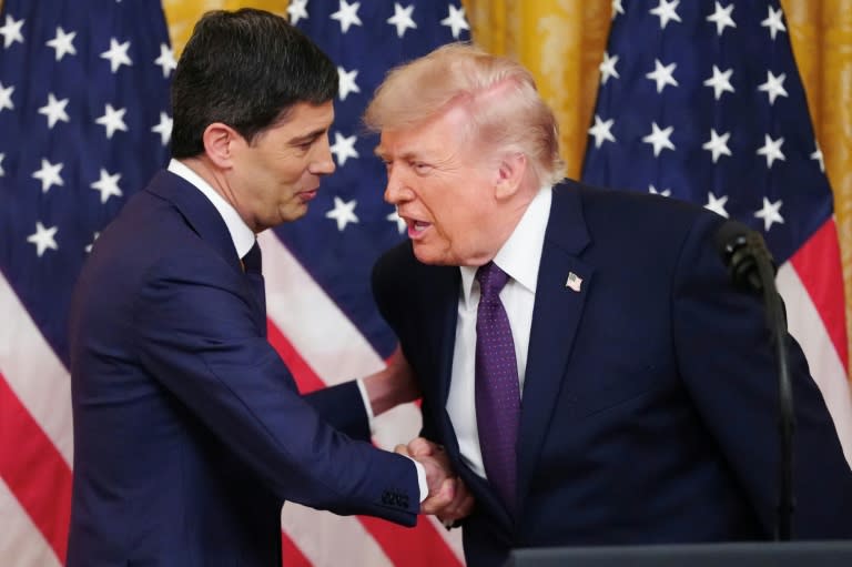 New US Federal Reserve chairman Kevin Warsh (L) is likely to face pressure, as his predecessor did, from President Donald Trump to lower interest rates (Aaron Schwartz)