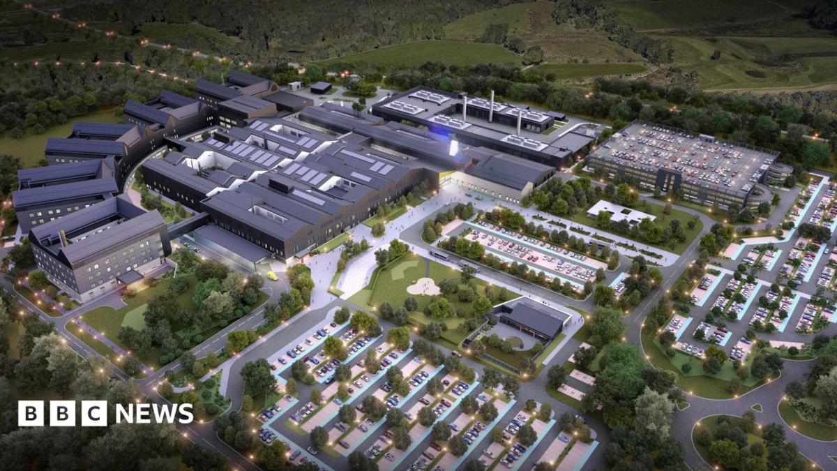 An artist's impression of a hospital, with several buildings, parking spaces and green space