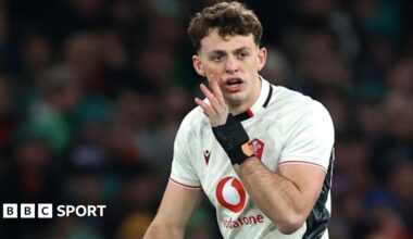 Louie Hennessey shouts with hand to mouth during a Wales game