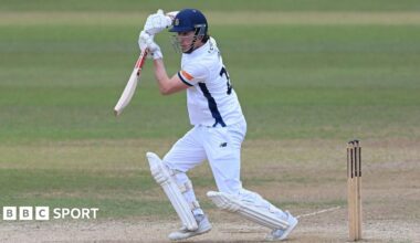 Left-handed Hampshire opener Ali Orr plays off-drive, wearing whits and Hampshire blue club helmet.