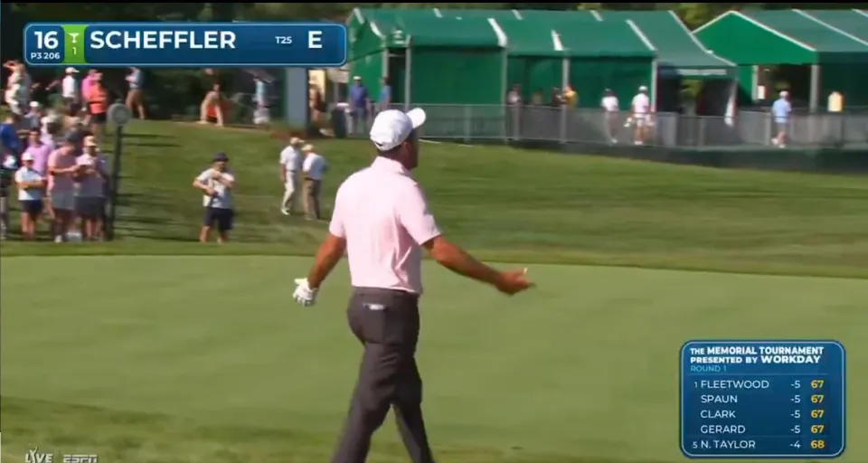 Scotty Scheffler in a heated exchange with his caddie Tim Scott.