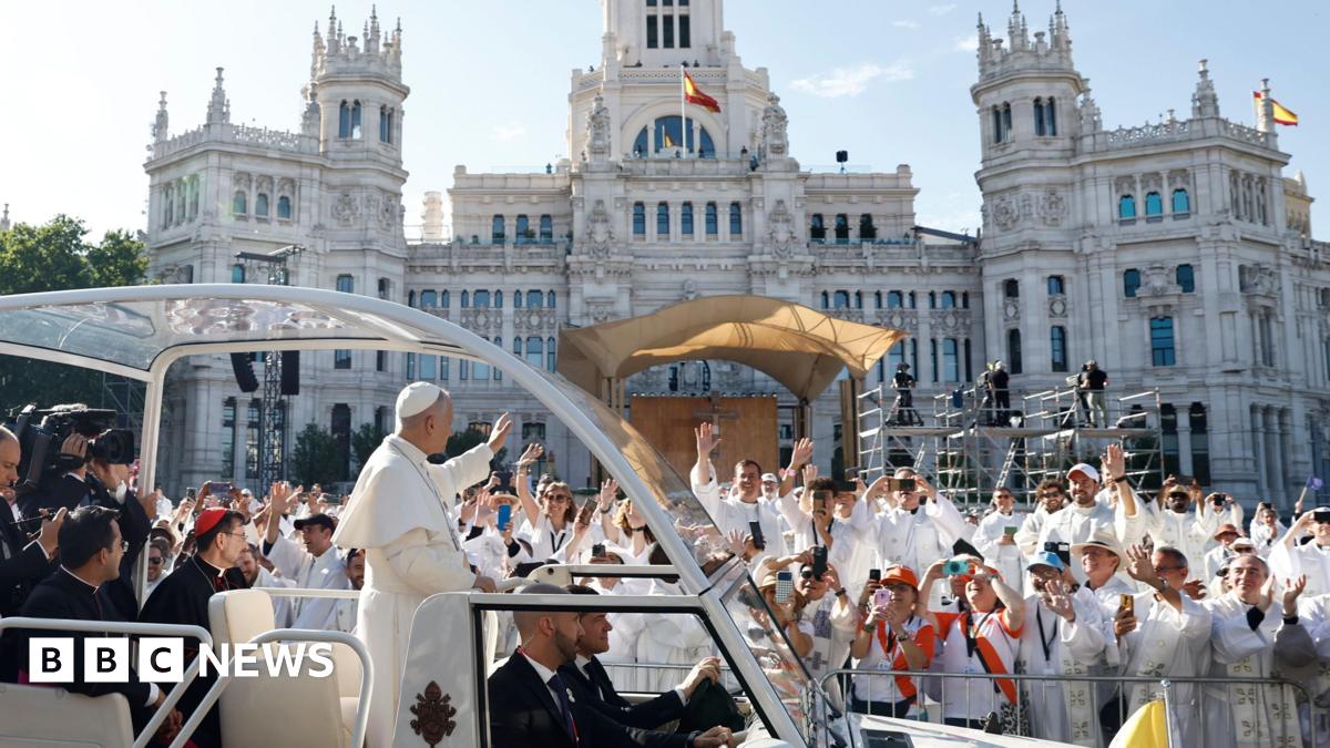 Pope Leo XIV waves to faithful from his popemobile