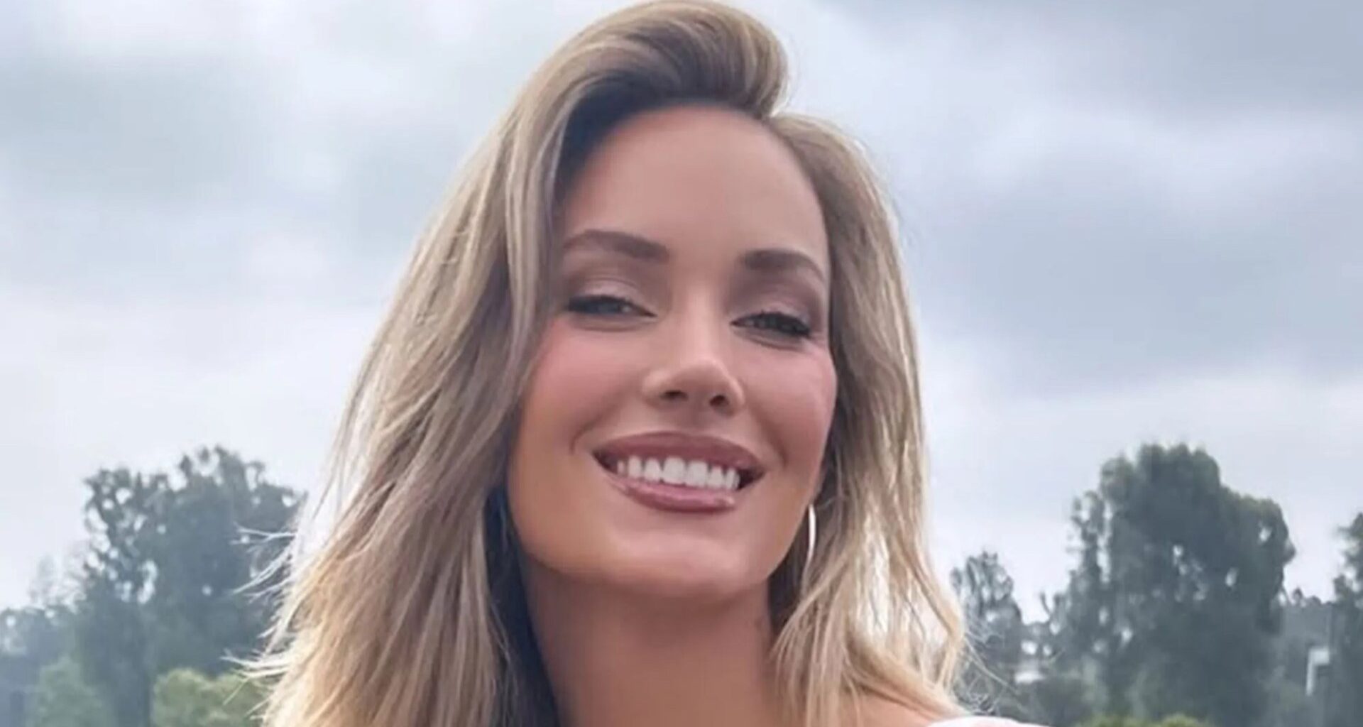 Paige Spiranac threatens to burst out of figure-hugging outfit on course as she heads to US Women's Open