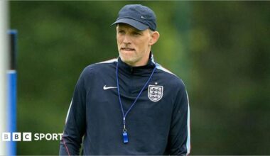 Thomas Tuchel wearing a baseball cap and England branded top during a training session at the World Cup