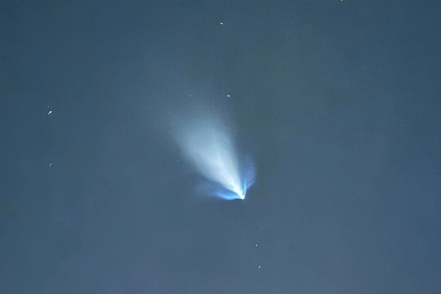 Trail of light in sky