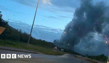 Crews tackling fire with 'large plumes of smoke' at Tata Steel - BBC