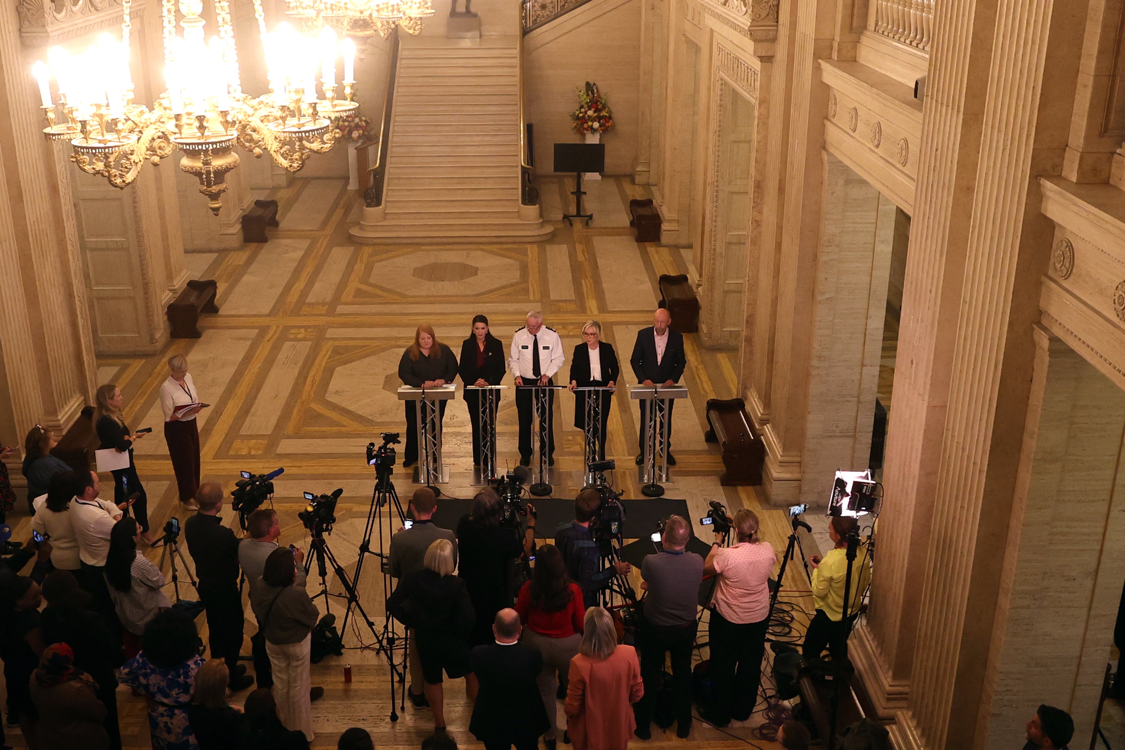 (left to right) Justice Minister Naomi Long, deputy first Minister Emma Little-Pengelly, PSNI chief Constable Jon Boutcher, First Minister Michelle O’Neill and chairman of the policing board Brendan Mullan speaking to the media (Liam McBurney/PA)