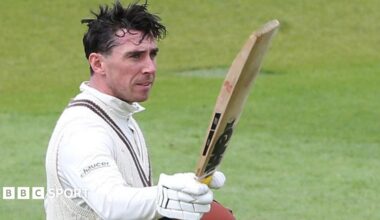 Dan Lawrence raises his bat