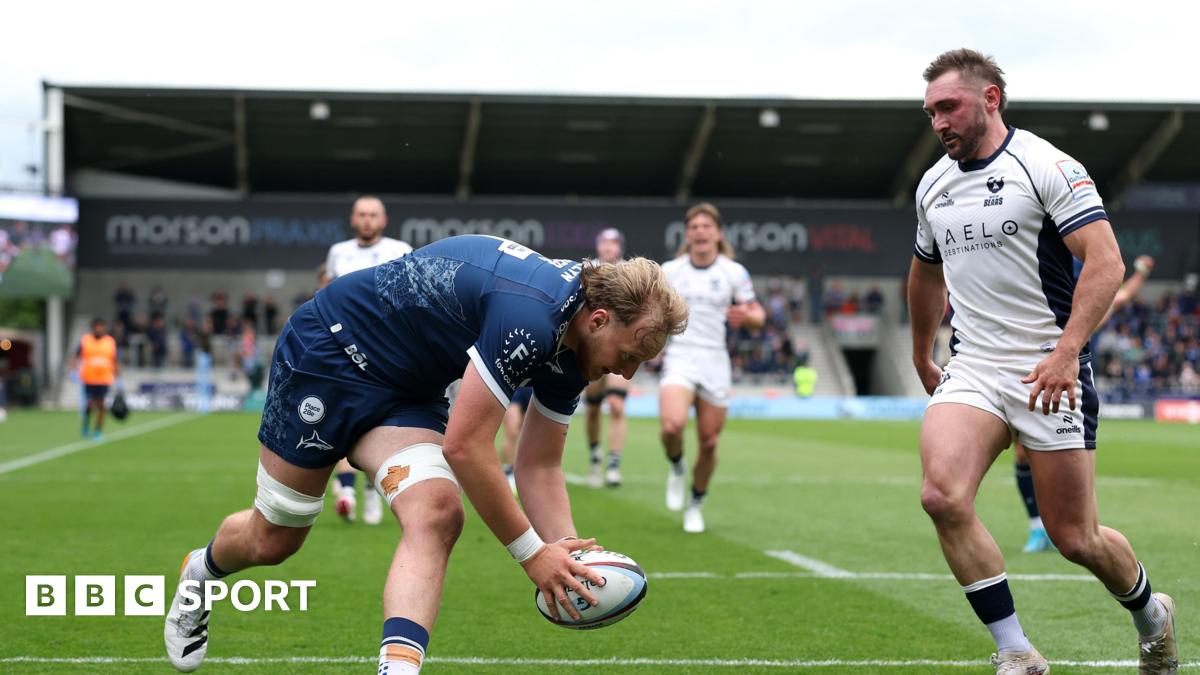 Sale second row Ben Bamber about to put the ball down for his side's second try with Bristol full-back Rich Lane watching on