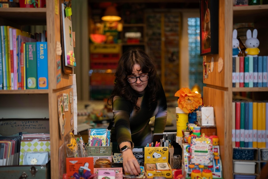 Zoe Crook arranges a shop display.