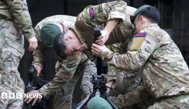Members of the Royal Marines Reserve assemble a 50 calibre Heavy Machine Gun (HMG) before the first ever Lady Mayor's Show in the City of London, in November 2025
