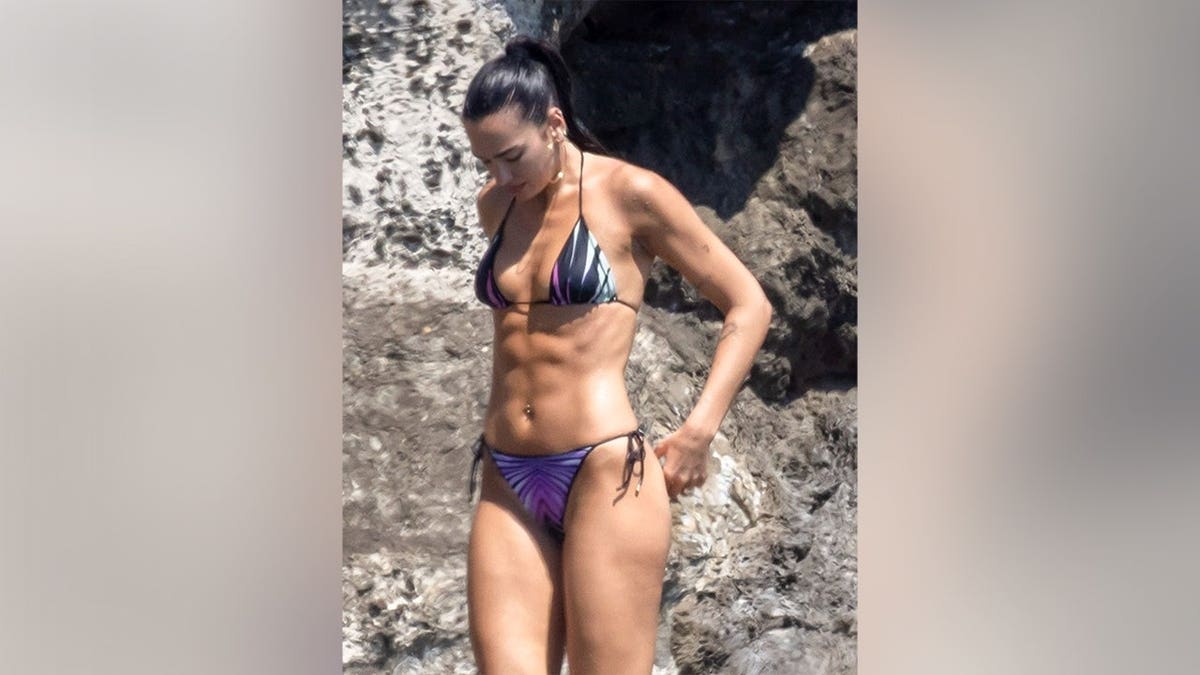 Dua Lipa in a string bikini in Italy in June 2026.