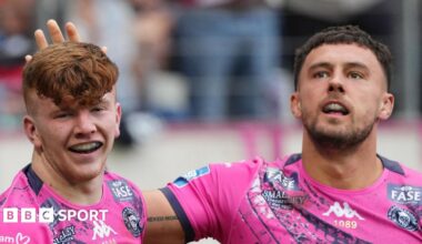 George Marsden (left) celebrates his try for Wigan Warriors against Catalans Dragons